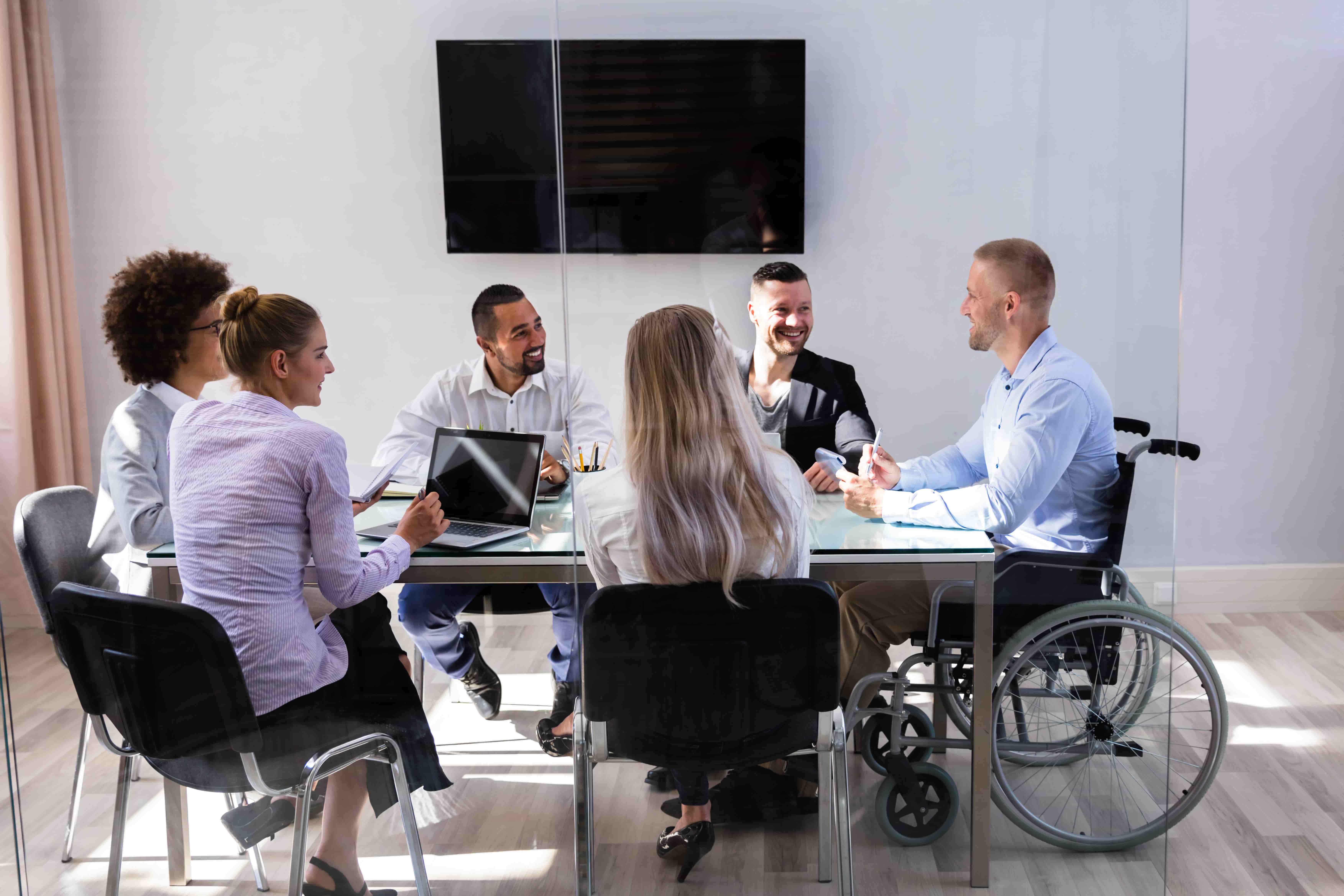 diverse and inclusive team meeting in conference room