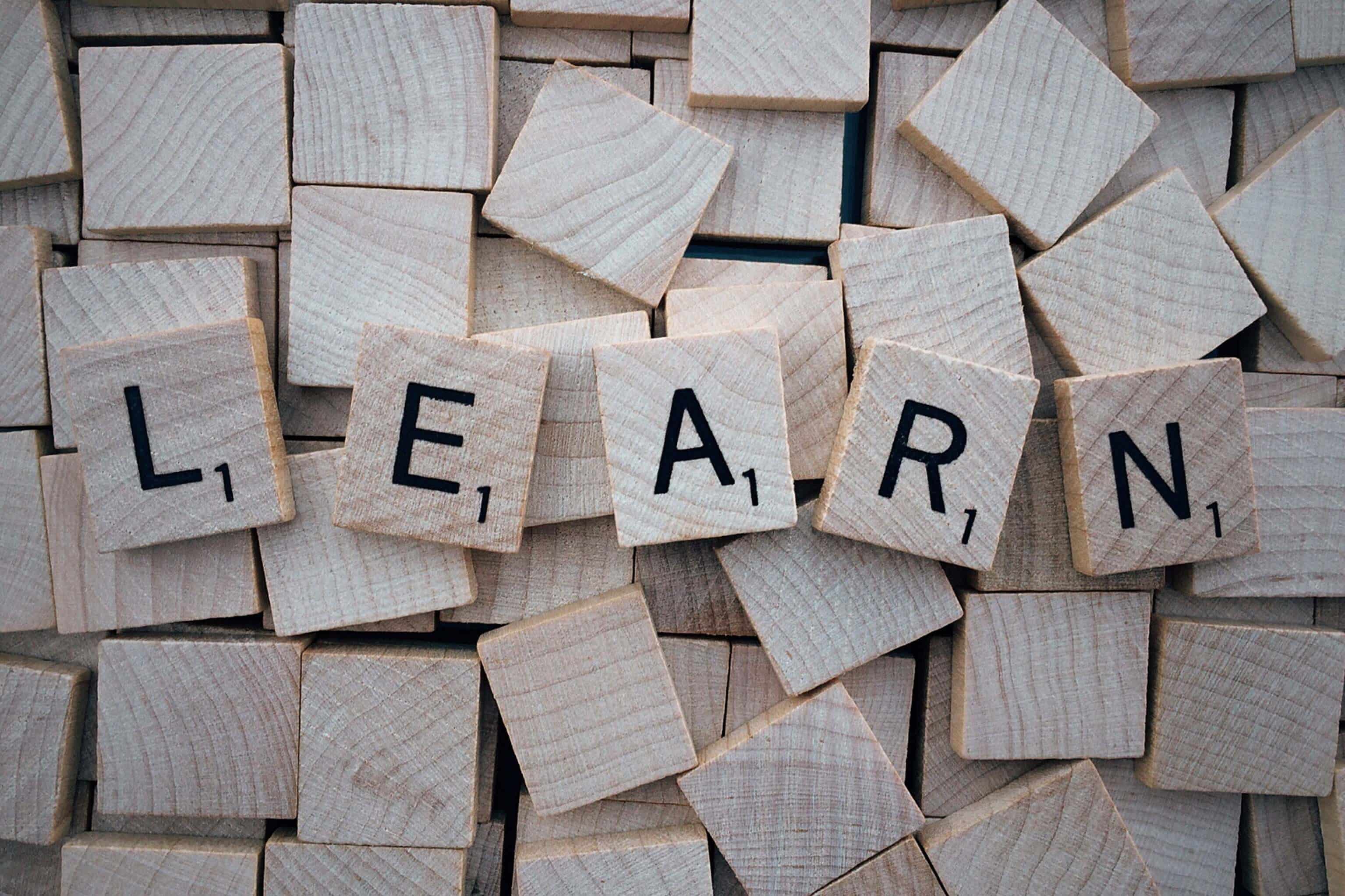 Scrabble tiles spelling the word 'learn'